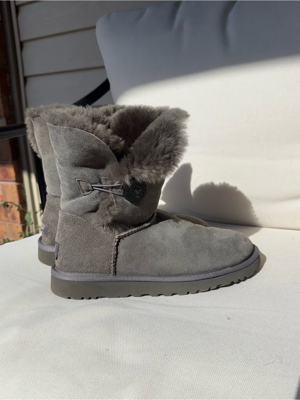 Women's Short Sheepskin Bailey Button Ugg Winter Boots in Gray